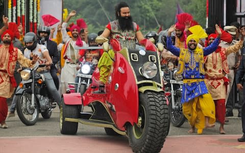 'Guru of bling' Gurmeet Ram Rahim was also sentenced for rape last year, triggering widespread rioting - Credit: Tsering Topgyal/ AP