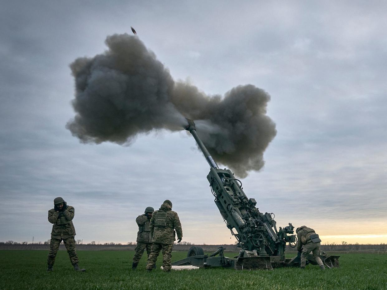 Ukrainian soldiers fire at Russian positions from a U.S.-supplied M777 howitzer in Kherson region, Ukraine, Jan. 9, 2023.