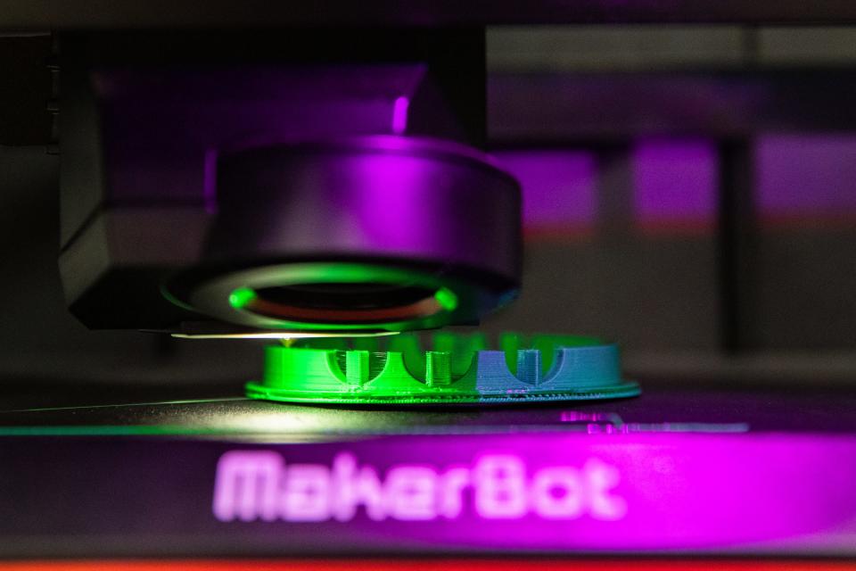 A 3D printer creates a propeller guard for a robot at the Baker Middle School robotics team meeting on Friday, June 24, 2022.