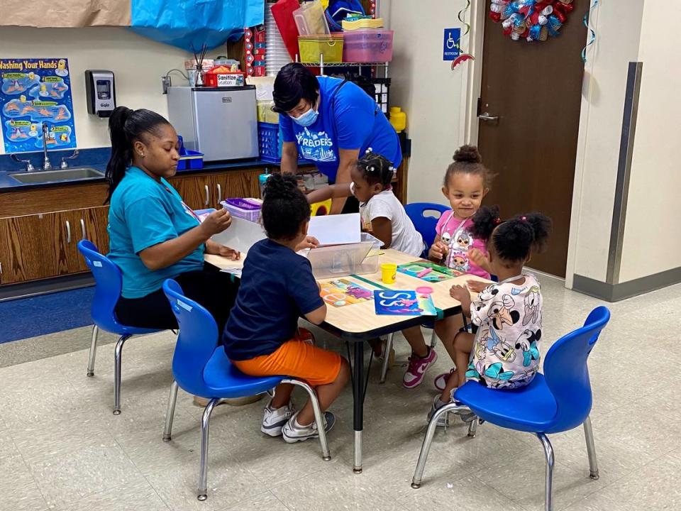 Rising kindergarteners at Renaissance West STEAM Academy work on reading skills through the YMCA’s Y Readers summer program.