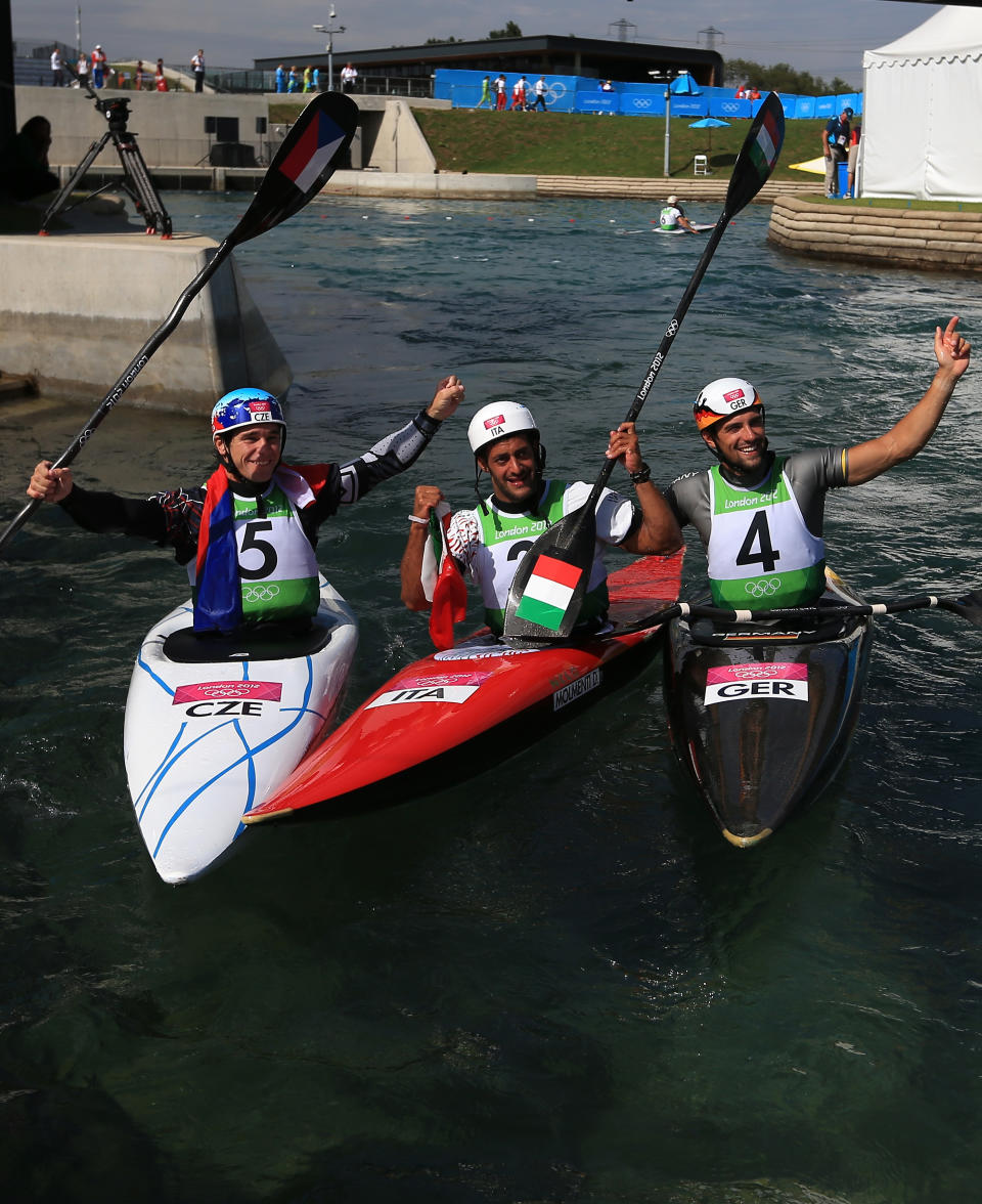 LONDON, ENGLAND - AUGUST 01: Daniele Molmenti (C) of Italy celebrates winning the gold medal with silver medalist Vavrinec Hradilek of Czech Republic and bronze medalist Hannes Aigner of Germany after the Men's Kayak Single (K1) Final on Day 5 of the London 2012 Olympic Games at Lee Valley White Water Centre on August 1, 2012 in London, England. (Photo by Phil Walter/Getty Images)