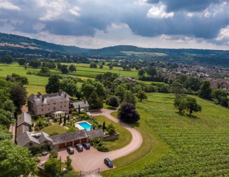 South Wales Argus: The home has a swimming pool and is surrounded by country views with a vineyard. Picture: Knight Frank