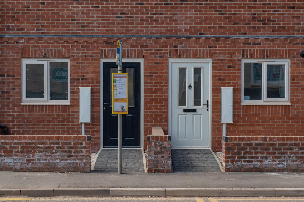 The bus stop was placed in front of the property in Stapenhill, Burton, Staffordshire. (SWNS)
