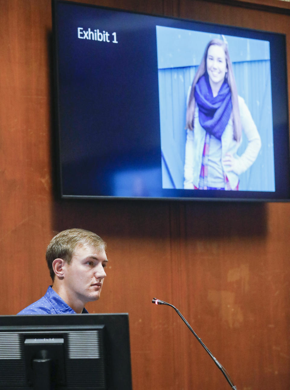 A photograph of Mollie Tibbetts is shown in the courtroom as Dalton Jack testifies during the trial of Cristhian Bahena Rivera at the Scott County Courthouse in Davenport, Iowa, on Wednesday, May 19, 2021. Rivera is charged with first-degree murder in the death of Tibbetts. Jack was Tibbetts' boyfriend at the time of her death. (Jim Slosiarek/The Gazette via AP, Pool)