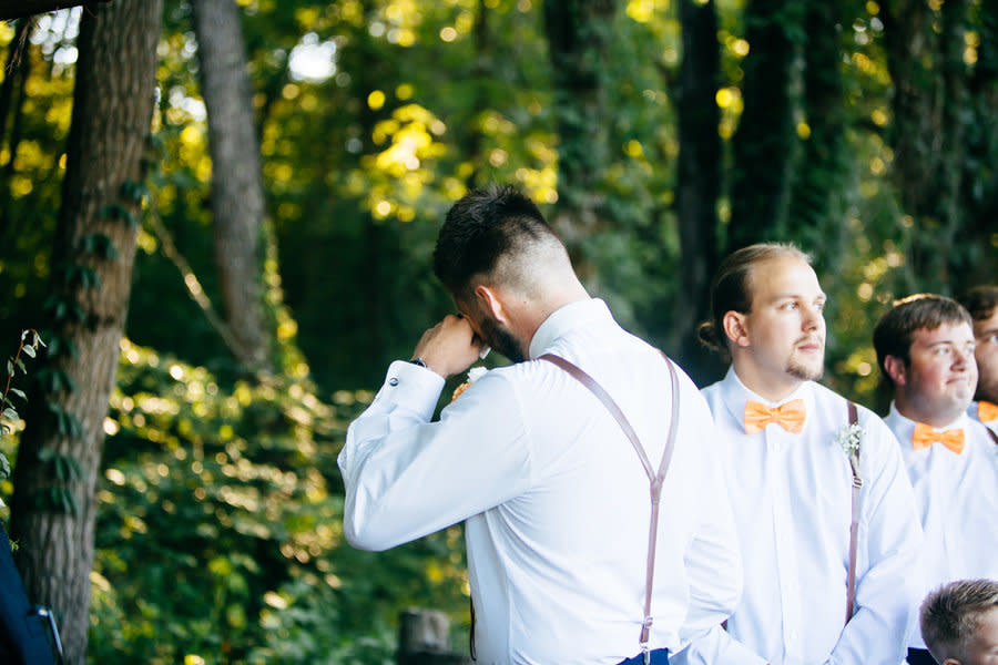 Micah's best man prompted him to turn around as his bride came down the aisle.&nbsp; (Photo: <a href="http://www.amberlowephoto.com/" target="_blank">Amber Lowe Photo</a>)