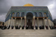 Muslim women gather for Friday prayer, next to the Dome of the Rock Mosque in the Al Aqsa Mosque compound in Jerusalem's old city, Friday, Nov. 6, 2020. The Palestinian leadership has condemned the United Arab Emirates' decision to forge ties with Israel as a "betrayal," but it could lead to a tourism bonanza for Palestinians in east Jerusalem as Israel courts wealthy Gulf travelers. (AP Photo/Mahmoud Illean)