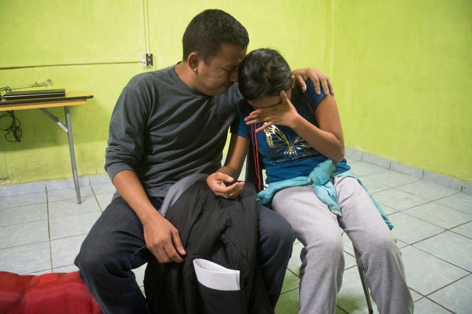 A migrant cries as he recounts the treatment his daughter received from Customs and Border Protection in San Diego. The pair was returned to Tijuana, Mexico, under the Migrant Protection Protocol policy and took refuge in the Agape shelter in Tijuana.