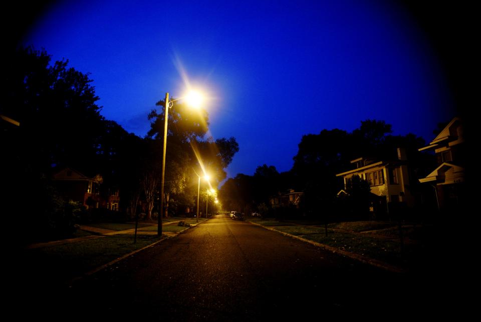 Forrest Ave. in the South Highland neighborhood is dark with exception of streetlights in the early hours of Saturday June 17, 2023. 