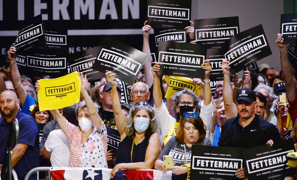 Supporters of Pennsylvania Lt. Gov. and Democratic Senate nominee John Fetterman cheer inside the Bayfront Convention Center in Erie on Aug. 12, 2022. It was Fetterman's first campaign event since suffering a stroke on May 13.