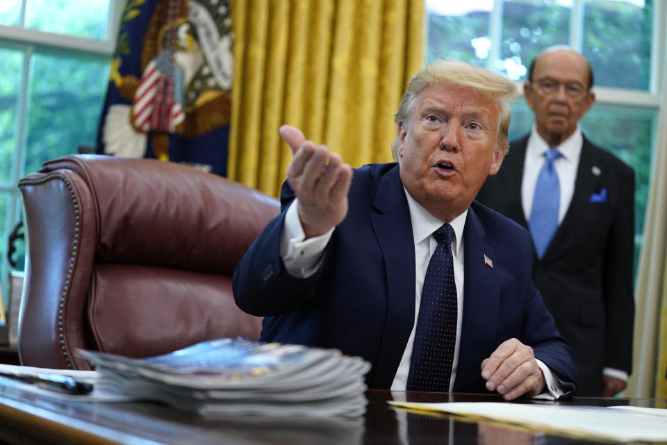 President Donald Trump speaks as he receives a briefing on the 2020 hurricane season in the Oval Office of the White House, Thursday, May 28, 2020, in Washington. (AP Photo/Evan Vucci)