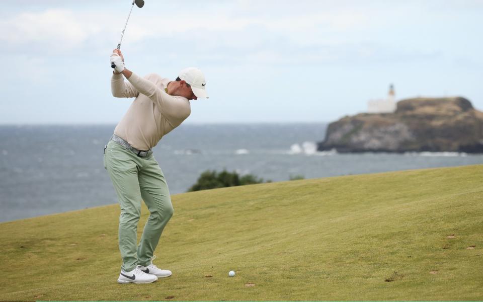 Rory McIlroy of Northern Ireland plays his second shot on the 13th hole during Day Four of the Genesis Scottish Open at The Renaissance Club