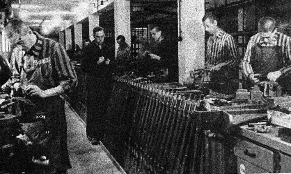 Jewish slave labourers in a Nazi ammunition factory near Dachau concentration camp. 