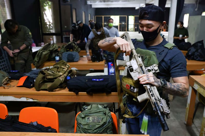 The Wider Image: More in Taiwan seek gun training as Ukraine war drives home China threat