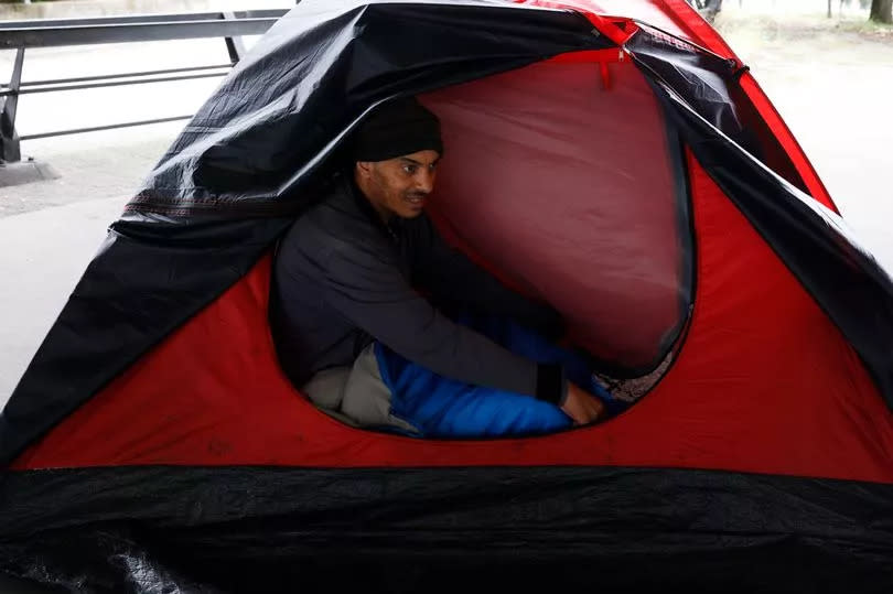 Luca Sebhltu in his tent under the Westway flyover in Paddington in London, Britain 10 June 2024