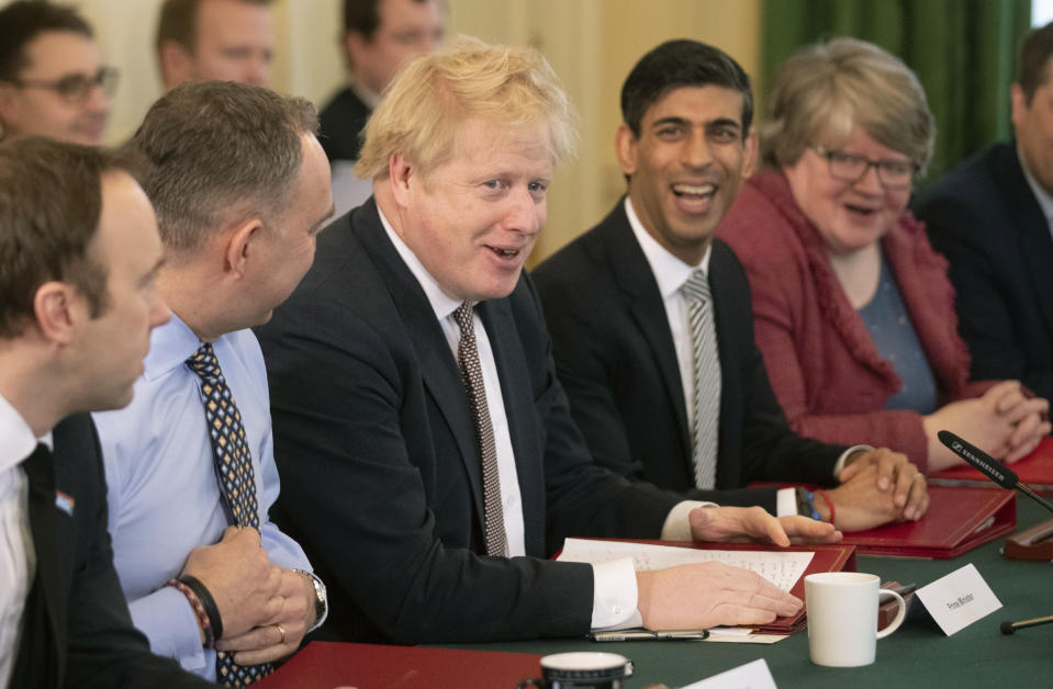 LONDON, ENGLAND - FEBRUARY 14: British Prime Minister Boris Johnson speaks during his first Cabinet meeting flanked by his new Chancellor of the Exchequer Rishi Sunak, fourth left, after a reshuffle the day before, inside 10 Downing Street, at Downing Street on February 14, 2020 in London, England. The Prime Minister reshuffled the Cabinet yesterday. High profile changes were Attorney General Geoffrey Cox, Business Secretary Andrea Leadsom, Housing Minister Esther McVey and Northern Ireland Minister Julian Smith all sacked and Chancellor Sajid Javid resigned. (Photo by Matt Dunham - WPA Pool/Getty Images)