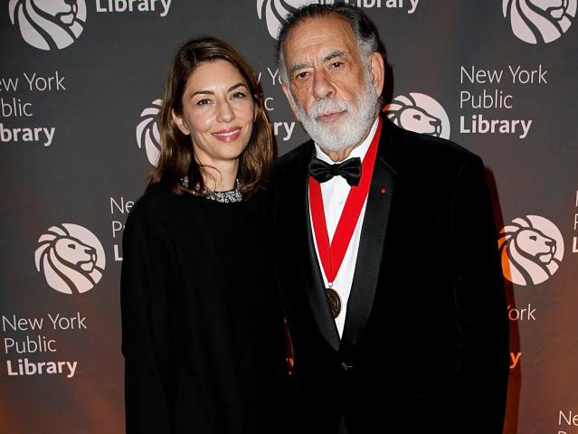 Sofia Coppola standing next to father Francis Ford Coppola