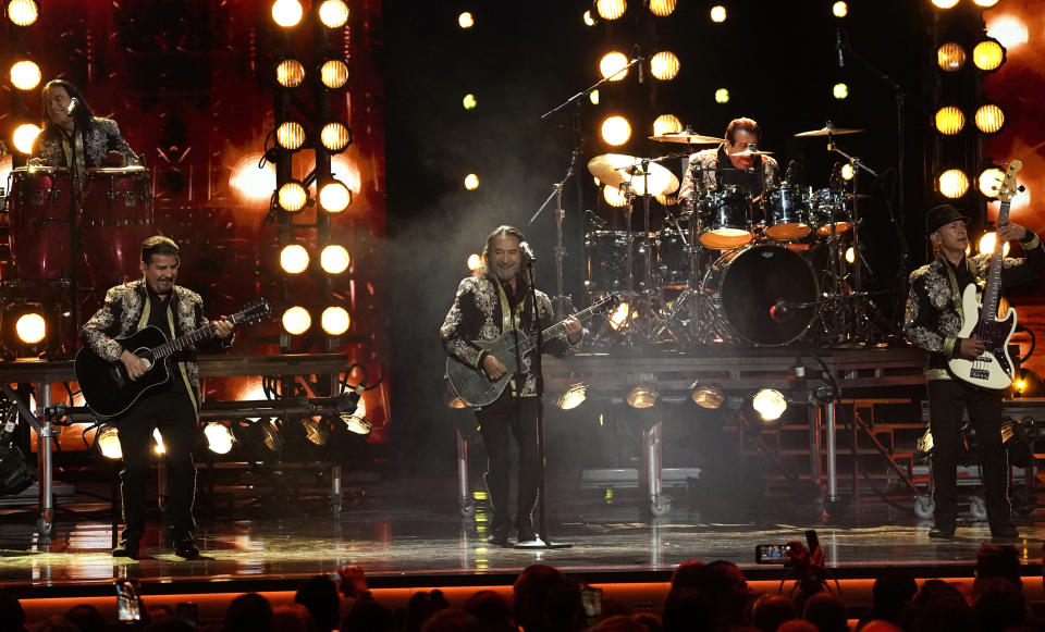 Person of the Year honoree Marco Antonio Solis and Los Bukis perform "Tu Carcel" at the 23rd annual Latin Grammy Awards at the Mandalay Bay Michelob Ultra Arena on Thursday, Nov. 17, 2022, in Las Vegas. (AP Photo/Chris Pizzello)