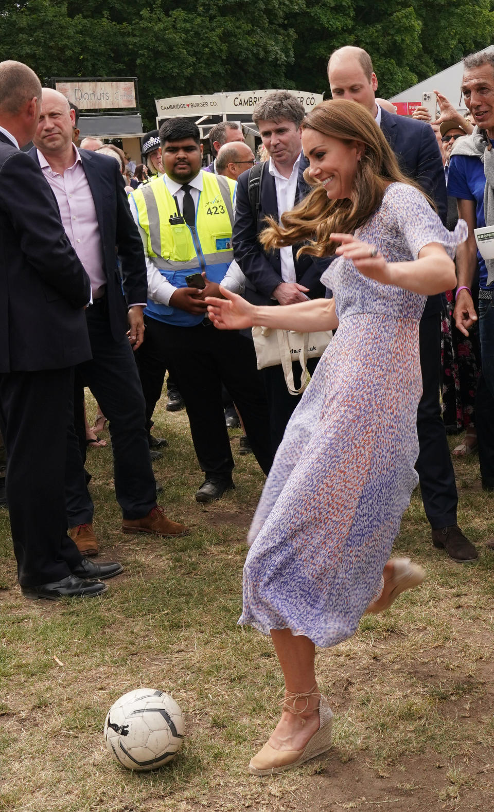 The Duchess of Cambridge wears her Castaner wedges for 'active' appearances, such as the Cambridgeshire County Day where she was seen playing football with locals. (Getty Images)