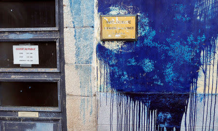 The Socialist party's headquarters is covered with blue paint in the southwerstern town of Tulle, France, May 6, 2017. REUTERS/Regis Duvignau