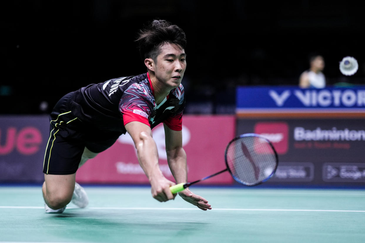 Singapore shuttler Loh Kean Yew in action against Thailand's Khosit Phetpradab at the Thomas Cup finals in Bangkok. 