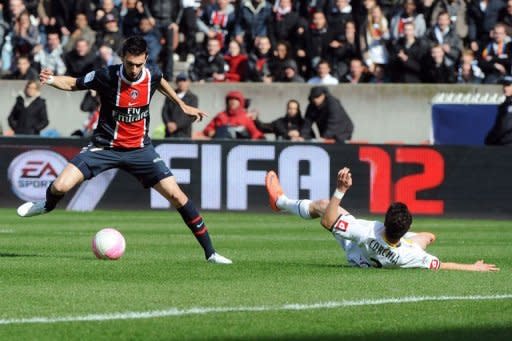 Paris Saint-Germain's Argentinian midfielder Javier Pastore (L) vies with Sochaux' French defender Sebastien Corchia during the French L1 football match PSG vs. Sochaux at the Parc des Princes in Paris. Paris Saint-Germain closed to within two points of Ligue 1 leaders Montpellier by overwhelming second-bottom Sochaux 6-1