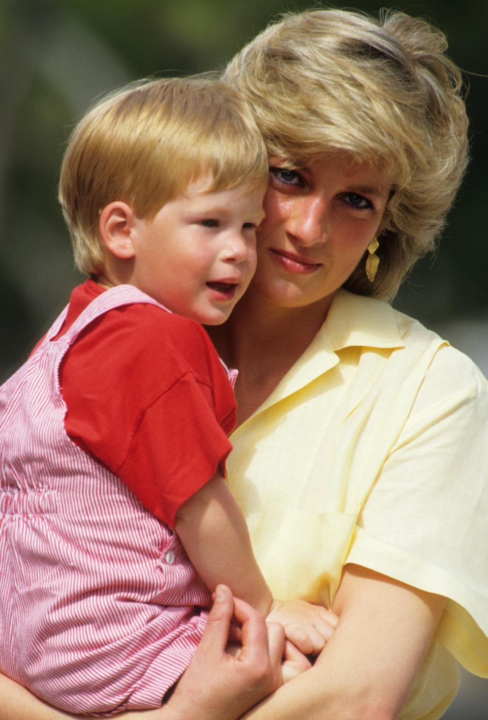 Diana, Princess of Wales with Prince Harry on holiday in Majorca, Spain in 1987.