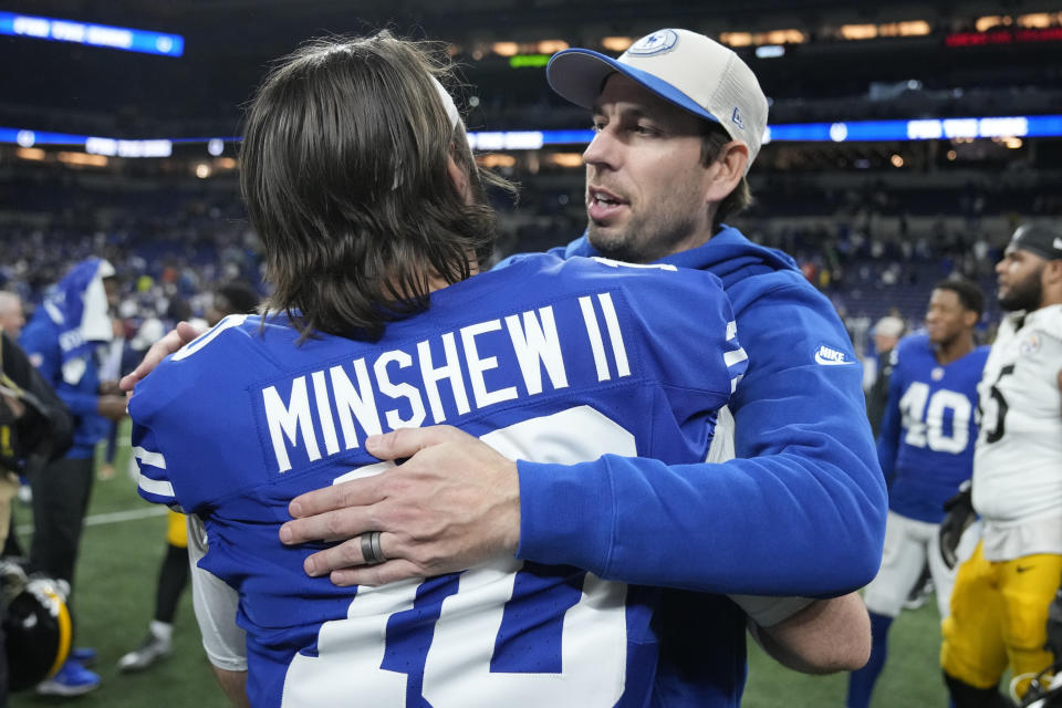 Indianapolis Colts head coach Shane Steichen, right, hugs Gardner Minshew, left, following an NFL football game against the Pittsburgh Steelers in Indianapolis Saturday, Dec. 16, 2023. (AP Photo/Michael Conroy)