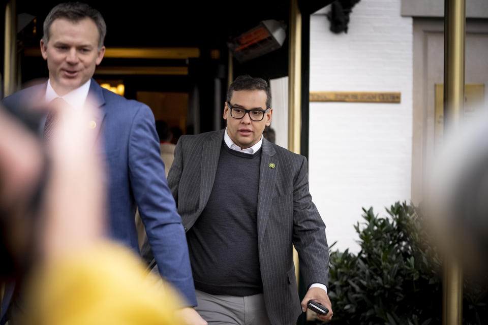 Rep. George Santos, R-N.Y., leaves a House GOP conference meeting on Capitol Hill in Washington, Wednesday, Jan. 25, 2023. (AP Photo/Andrew Harnik)