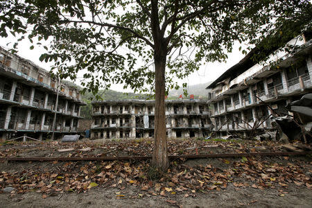 Beichuan Vocational Education Centre which was destroyed in the 2008 Sichuan earthquake stands in the city of Beichuan county, Sichuan province, China, April 6, 2018. REUTERS/Jason Lee