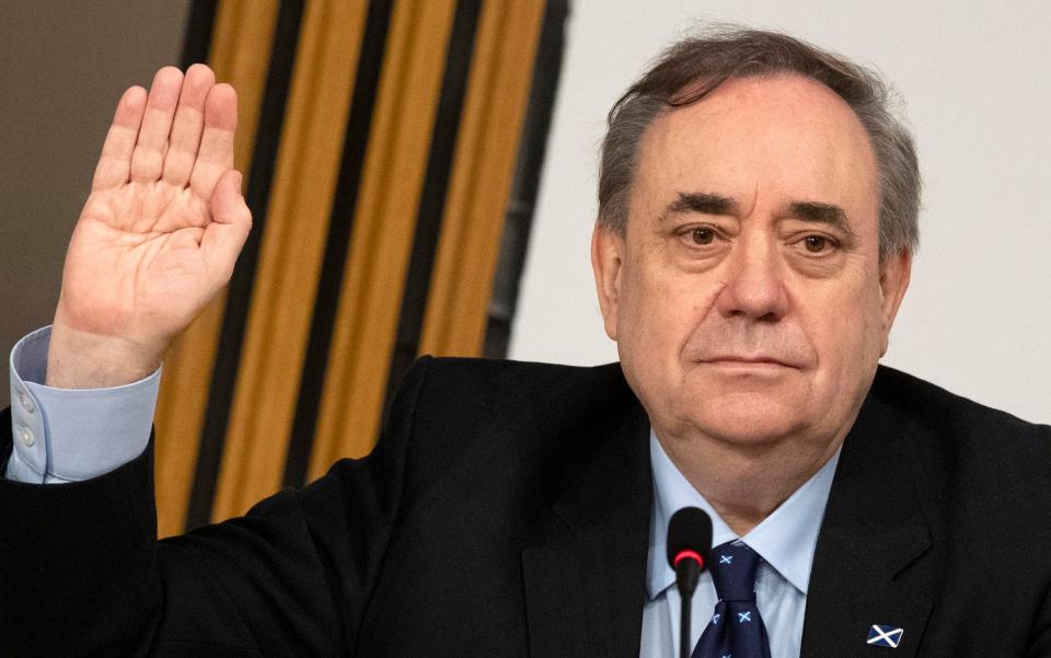 Alex Salmond is sworn in before giving evidence to a Scottish Parliament Harassment committee - Andy Buchanan/PA