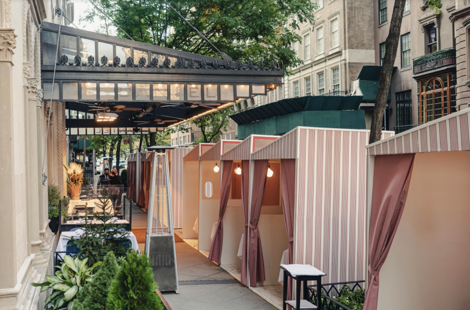 Chef Boulud’s restaurants utilize heated, curbside bungalows to shield customers from harsh winter winds while dining outdoors (Credit: Daniel Boulud)