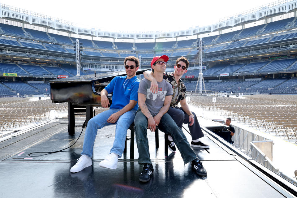 NEW YORK, NEW YORK - AUGUST 12: (L-R) Kevin Jonas, Joe Jonas, and Nick Jonas pose onstage before Jonas Brothers "Five Albums, One Night" Tour Opening Night at Yankee Stadium on August 12, 2023 in New York City. (Photo by Kevin Mazur/Getty Images for Live Nation)