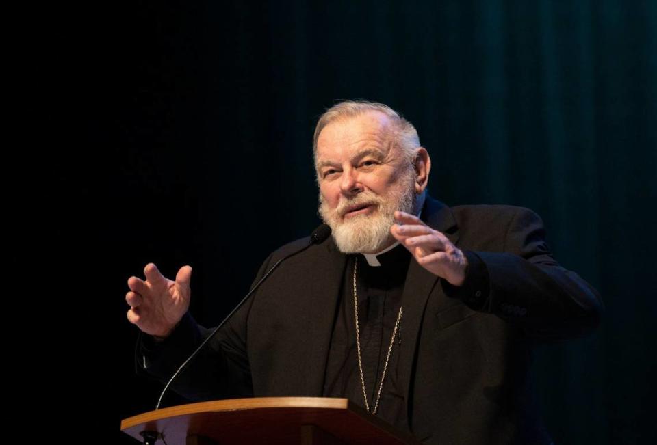 Archbishop Thomas Wenski speaks during the PACT assembly addressing the escalation of unaffordable rents and drivers license suspensions and unnecessary arrests with local government officials on Monday, April 15, 2024, at Barry University in Miami Shores. “Because the road was paved like this by sinners like us, we can un-pave it as sinners, too,” said Wenski.