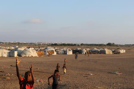 Children play at a camp sheltering displaced people from the Red Sea port city of Hodeidah near Aden, Yemen November 12, 2018. Pictures taken November 12, 2018. REUTERS/Fawaz Salman