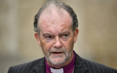 Bishop James Jones delivers a statement on behalf of the panel outside Portsmouth Cathedral  - Credit: Dominic Lipinski/PA