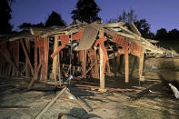 FILE - This photo provided by the Free Burma Rangers shows remains of a destroyed village school in Lay Wah, one of the villages in Karen state's Mutraw district, Myanmar, Thursday, Jan. 12, 2023. Two years after seizing power, Myanmar's military continues to face stiff armed resistance on the ground, and is responding increasingly with air strikes that resistance forces have little defense against, says a report released Tuesday, Jan. 31, 2023, by a human rights monitoring group. (Free Burma Rangers via AP, File)