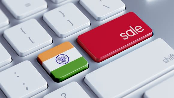 Computer keyboard with Indian flag button next to sale button