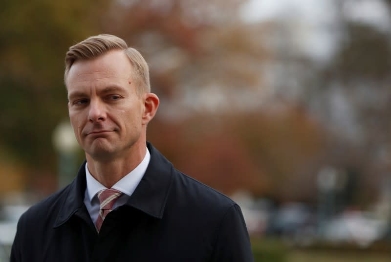 FILE PHOTO: David Holmes, the counselor for Political Affairs at the U.S. embassy in Ukraine, arrives to appear for a closed-door deposition as part of the impeachment inquiry into U.S. President Donald Trump on Capitol Hill in Washington