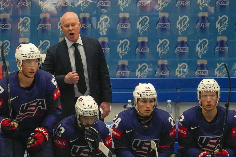Unted States' head coach John Hynes gives instructions to his players during the preliminary round match between Poland and United States at the Ice Hockey World Championships in Ostrava, Czech Republic, Friday, May 17, 2024. (AP Photo/Darko Vojinovic)