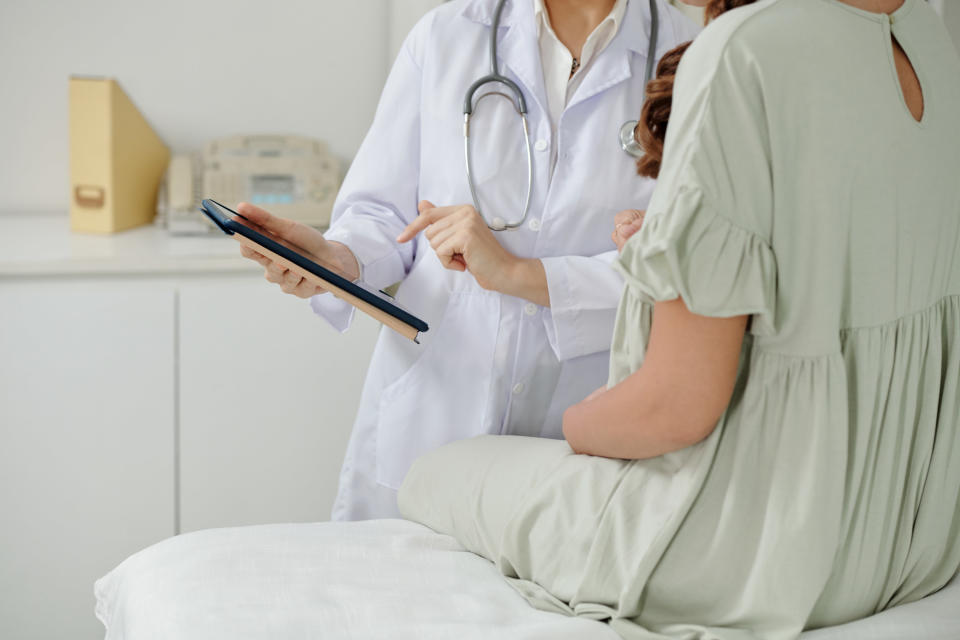 doctor talking to patient