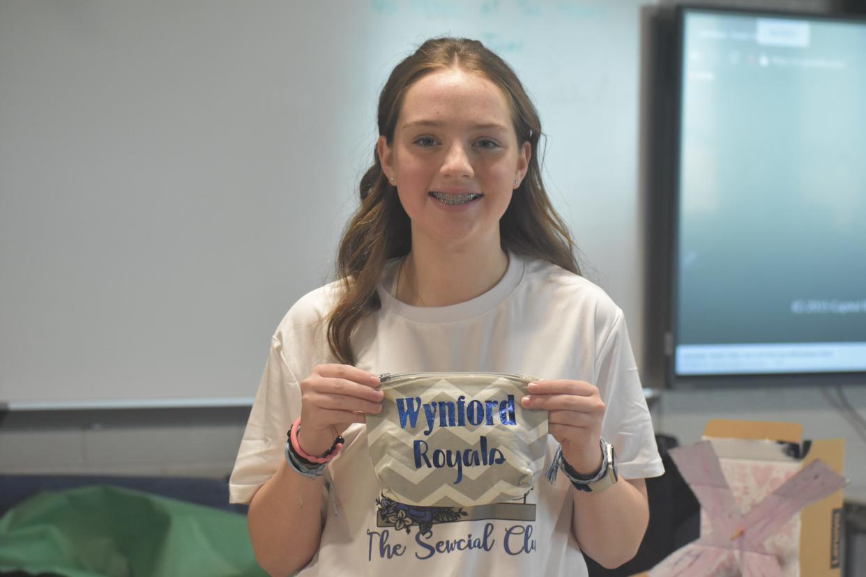 Brianna Brown, 14, shows her favorite project - a zipper pouch.