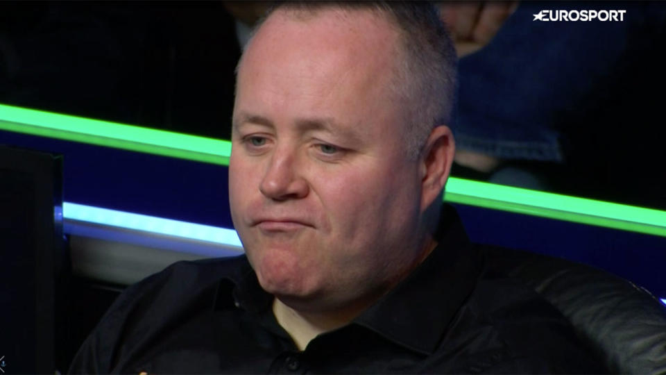 Seen here, John Higgins looked on in disbelief at the shot played by Judd Trump.