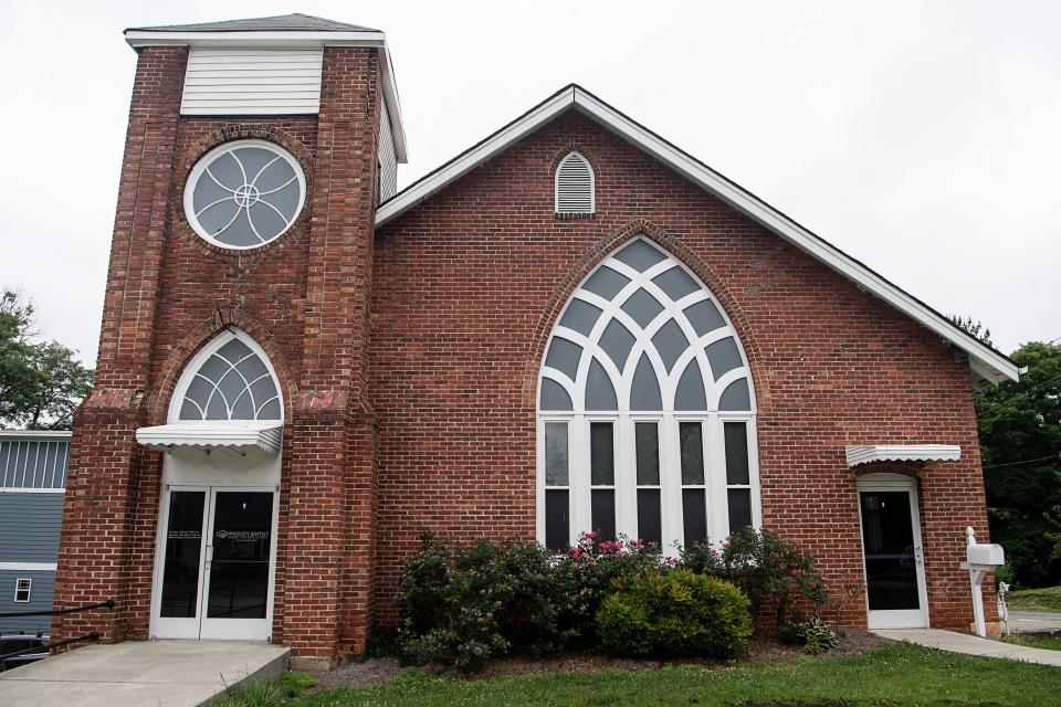 The Community Baptist Church was once located at 680 Haywood Road, where an old cemetery was found during construction in West Asheville.