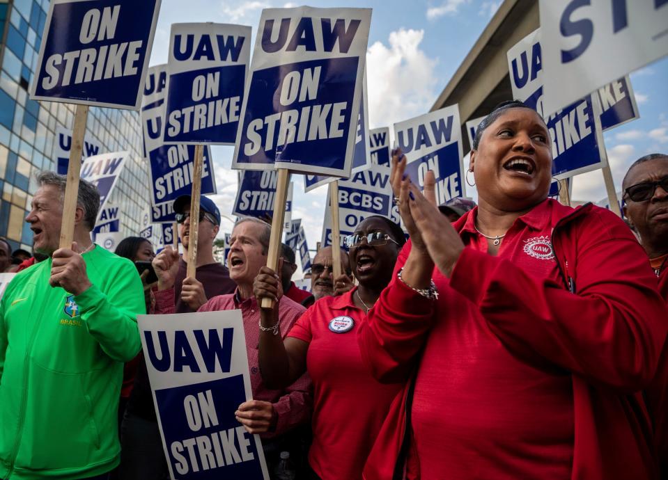 Laura Dickerson protests in solidarity alongside Blue Cross United Auto Workers members during a rally in Detroit on Friday, Sept. 15, 2023.