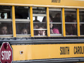 <p>A Townville Elementary student looks out of the window of a school bus as she and her classmates are transported to Oakdale Baptist Church, following a shooting at Townville Elementary in Townville Wednesday, Sept. 28, 2016. (Katie McLean/The Independent-Mail via AP) </p>