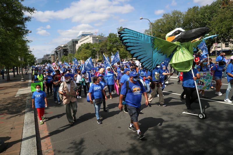 FILE PHOTO: Demonstrators march calling for a pathway to citizenship, in Washington