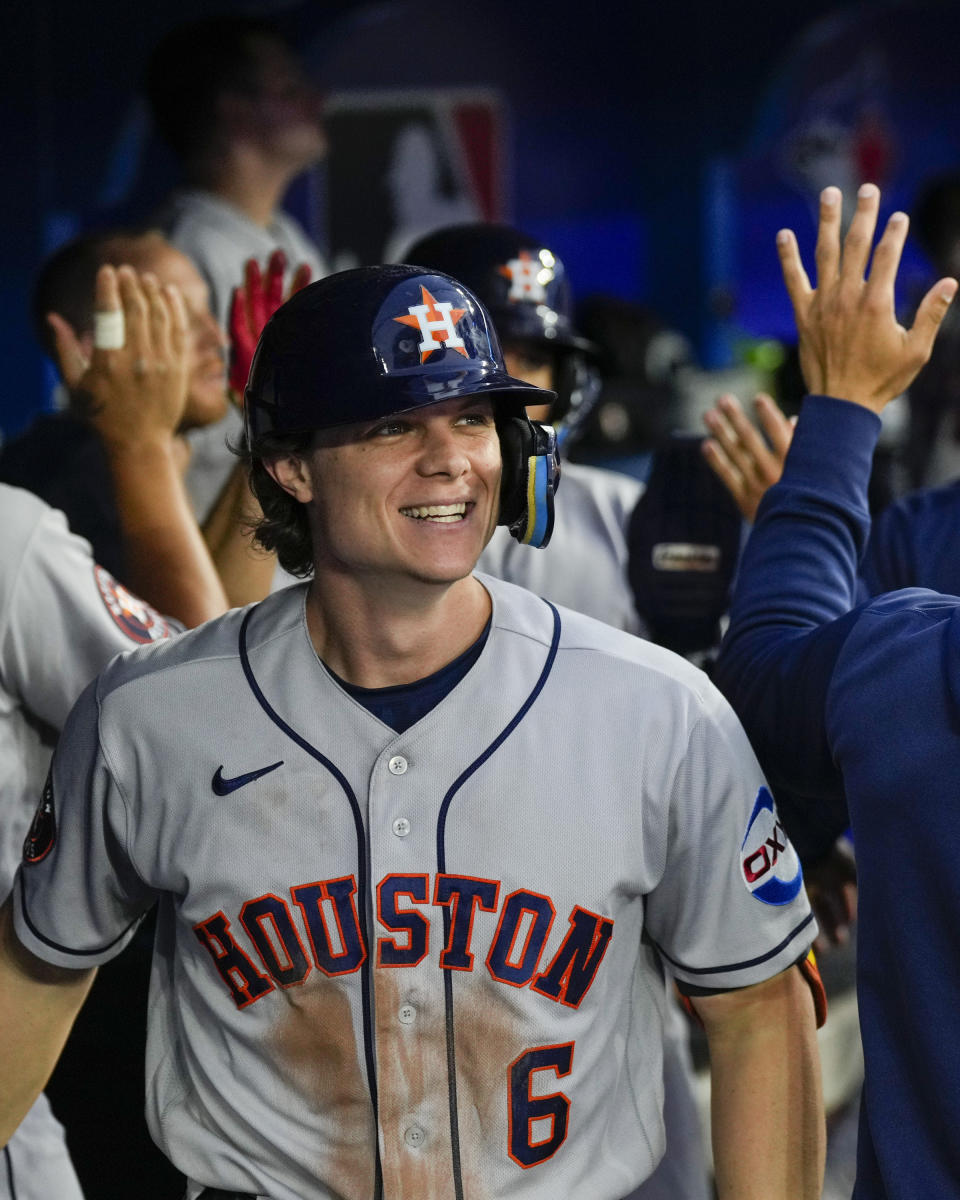 Houston Astros' Jake Meyers (6) celebrates in the dugout after his home run against the Toronto Blue Jays in fifth-inning baseball game action in Toronto, Ontario, Monday, June 5, 2023. (Andrew Lahodynskyj/The Canadian Press via AP)