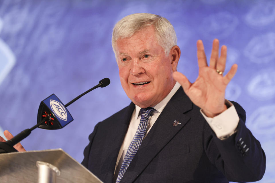 North Carolina head coach Mack Brown answers a question during the NCAA college football Atlantic Coast Conference media days in Charlotte, N.C., Wednesday, July 21, 2021. (AP Photo/Nell Redmond)