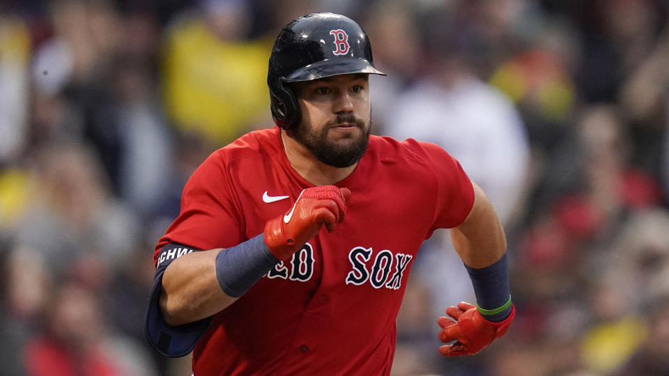 FILE - Boston Red Sox' Kyle Schwarber runs up the first baseline on a single against the Tampa Bay Rays during the third inning during Game 3 of a baseball American League Division Series, Sunday, Oct. 10, 2021, in Boston. Kyle Schwarber is coming to Philadelphia, agreeing Wednesday, March 16, 2022, to a four-year deal with the Phillies worth about $80 million, a person familiar with the negotiations told The Associated Press.(AP Photo/Charles Krupa)