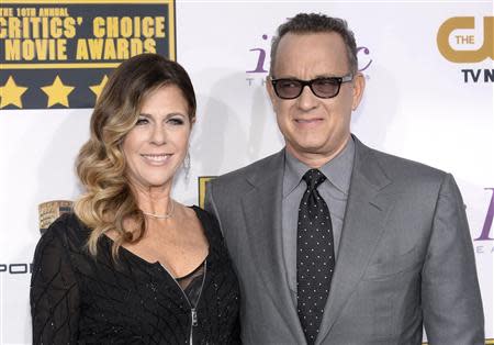 Actors and husband and wife Rita Wilson and Tom Hanks arrive at the 19th annual Critics' Choice Movie Awards in Santa Monica, California January 16, 2014. REUTERS/Kevork Djansezian